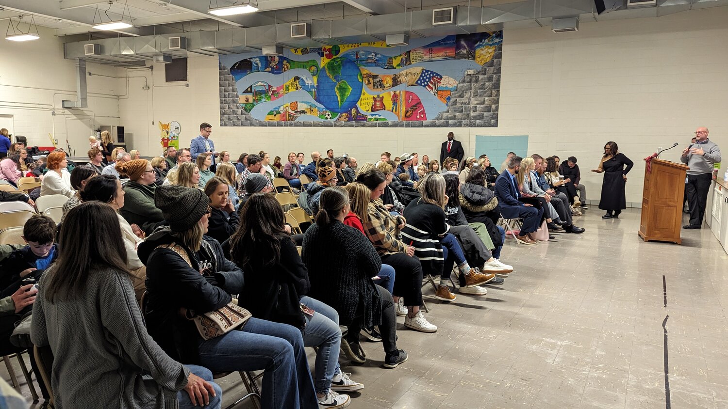 Superintendent Grenita Lathan and Deputy Superintendent Travis Shaw answer questions from some 120 community members at Pershing School last night.  